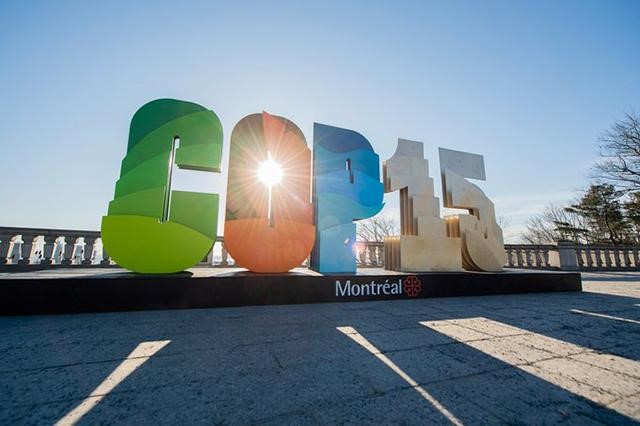 COP15 Montreal climate conference signage highlighting global biodiversity and environmental sustainability