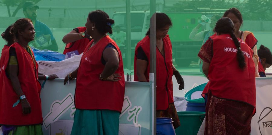 Hasiru Dala housekeeping staff managing waste segregation at a large public event in Bengaluru.